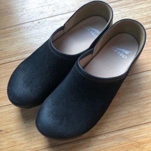 Dansko Brenna Black slip on clogs; Brand new. Never been worn.